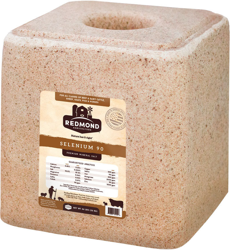 Redmond Selenium 90 premium mineral salt block, tan block with a center hole and a brown label.