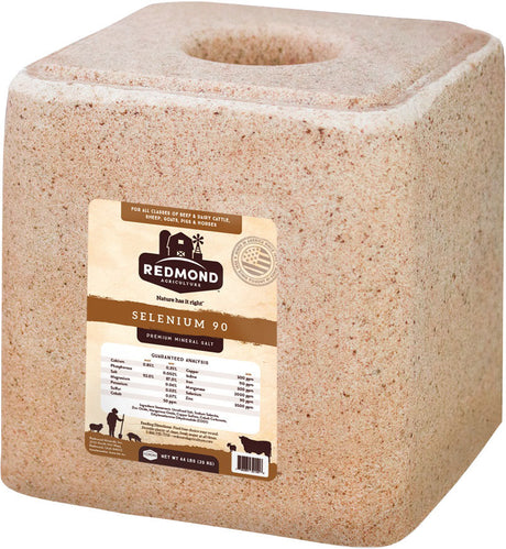 Redmond Selenium 90 premium mineral salt block, tan block with a center hole and a brown label.