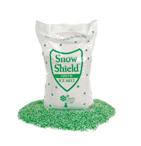 Snow Shield Green ice melt 50 lb bag from Chemical Equipment Labs with a pile of green granules, melts down to -20°F.