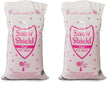 Two Snow Shield Pink ice melt 50 lb bags from Chemical Equipment Labs, printed melts down to -20°F.