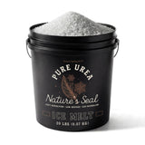 Nature's Seal Pure Urea Ice Melt 20 lb black bucket heaped with white pellets.